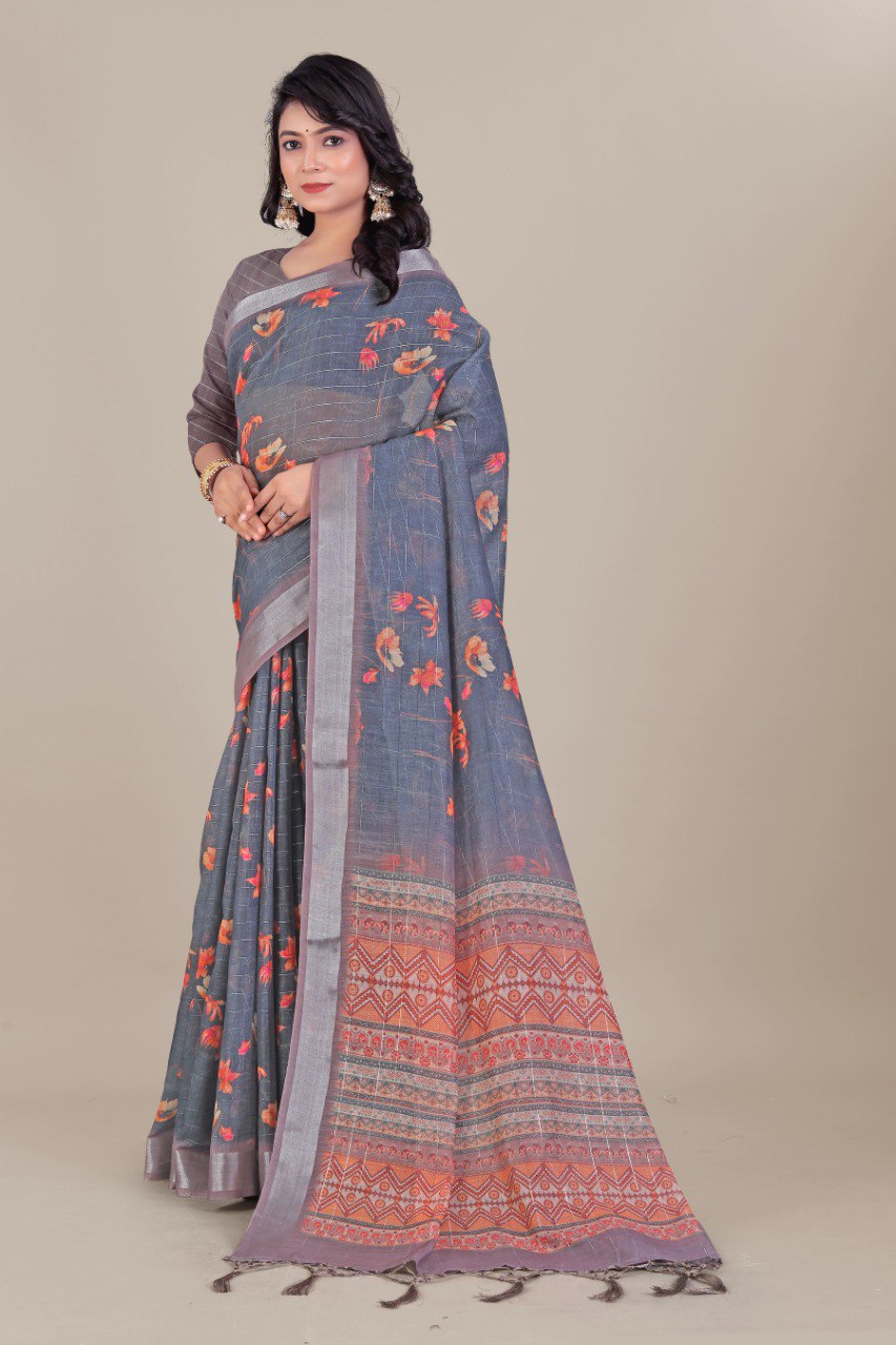 Grey linen saree with floral prints and red woven border – traditional Indian ethnic wear.