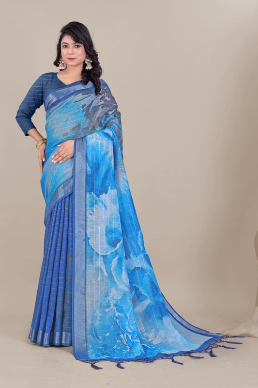 Blue linen saree with silver zari border and watercolor print