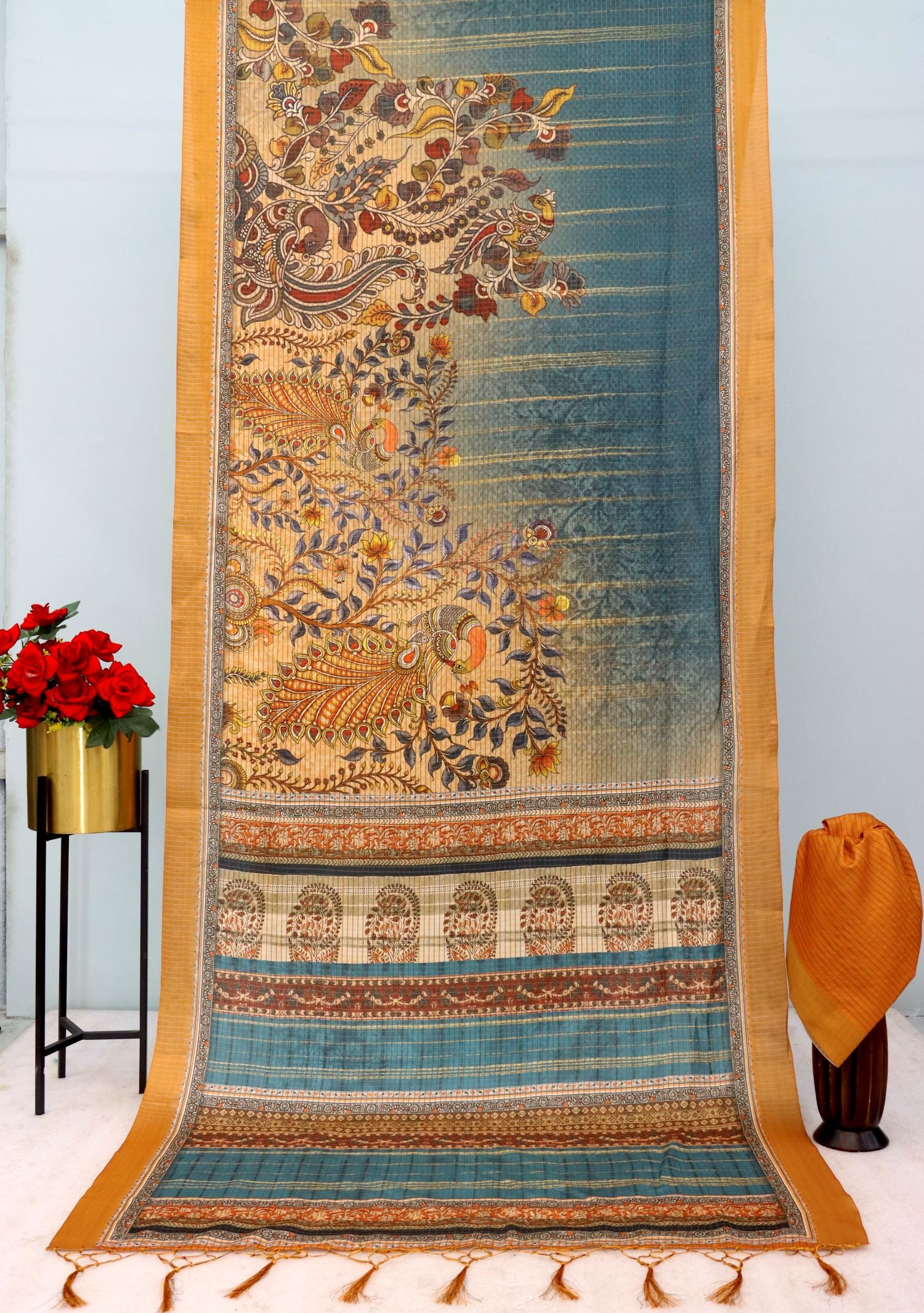 Mysore silk saree in teal and mustard with peacock jari design
