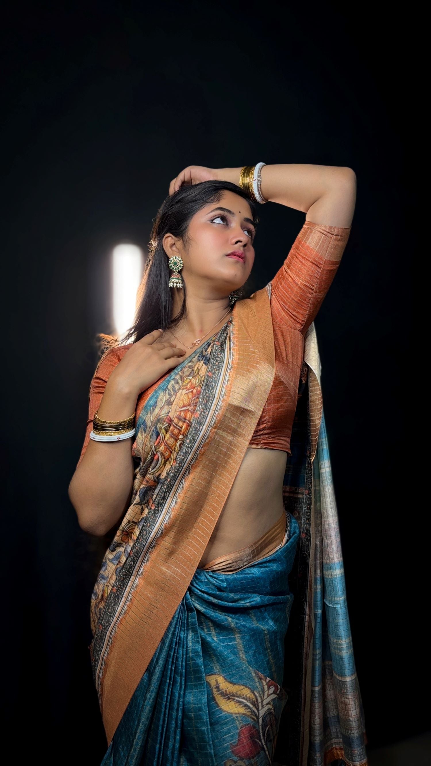 Mysore silk saree in teal and mustard with peacock jari design