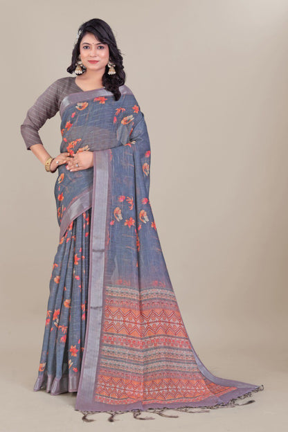 Grey linen saree with floral prints and red woven border – traditional Indian ethnic wear.
