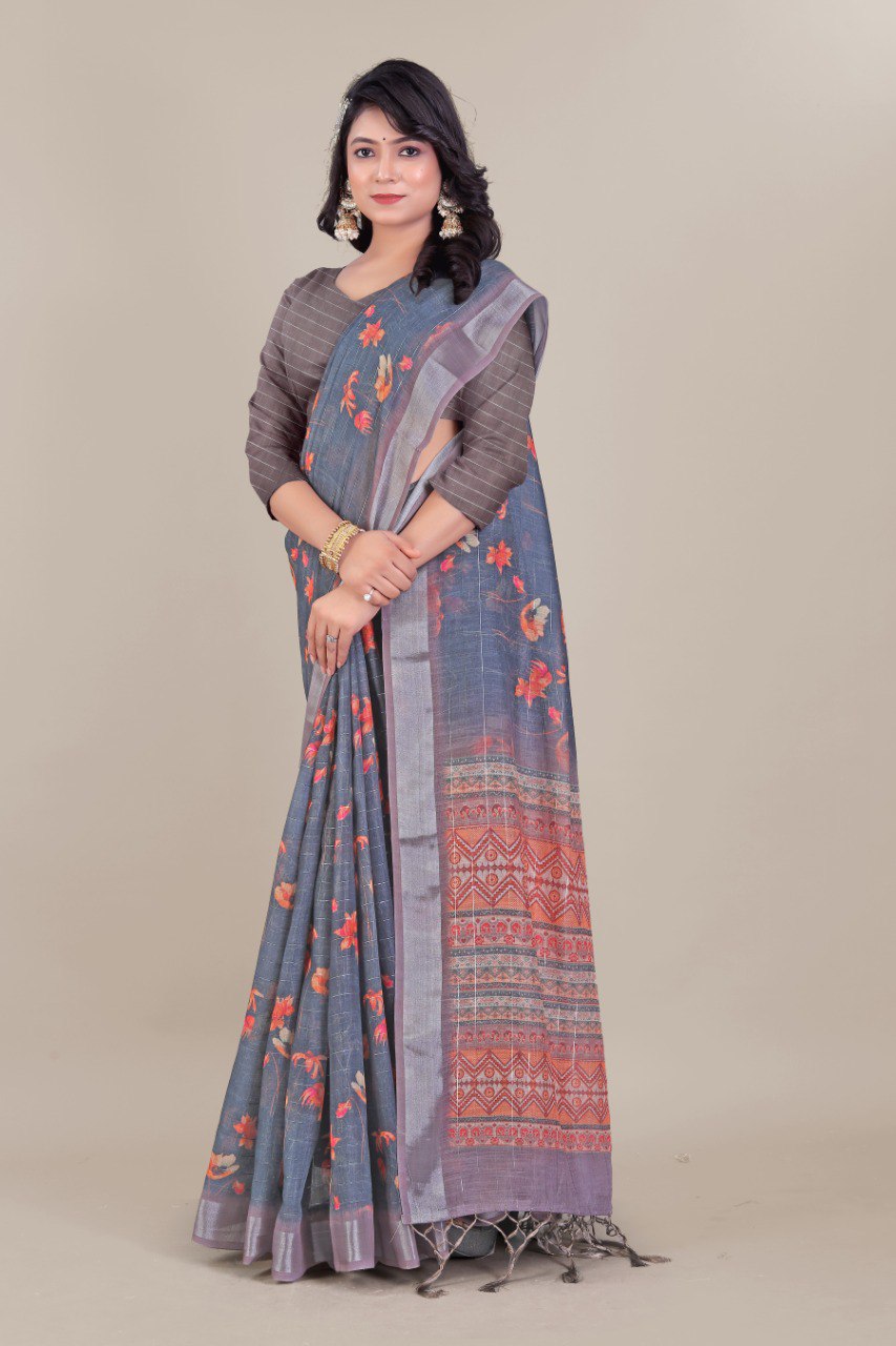Grey linen saree with floral prints and red woven border – traditional Indian ethnic wear.