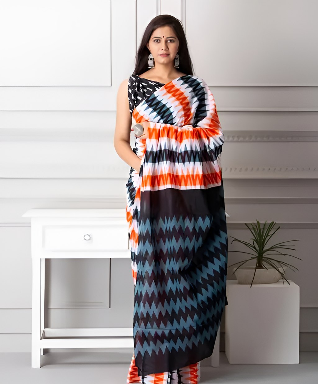 Woman wearing elegant multicolor zigzag printed pure linen cotton saree