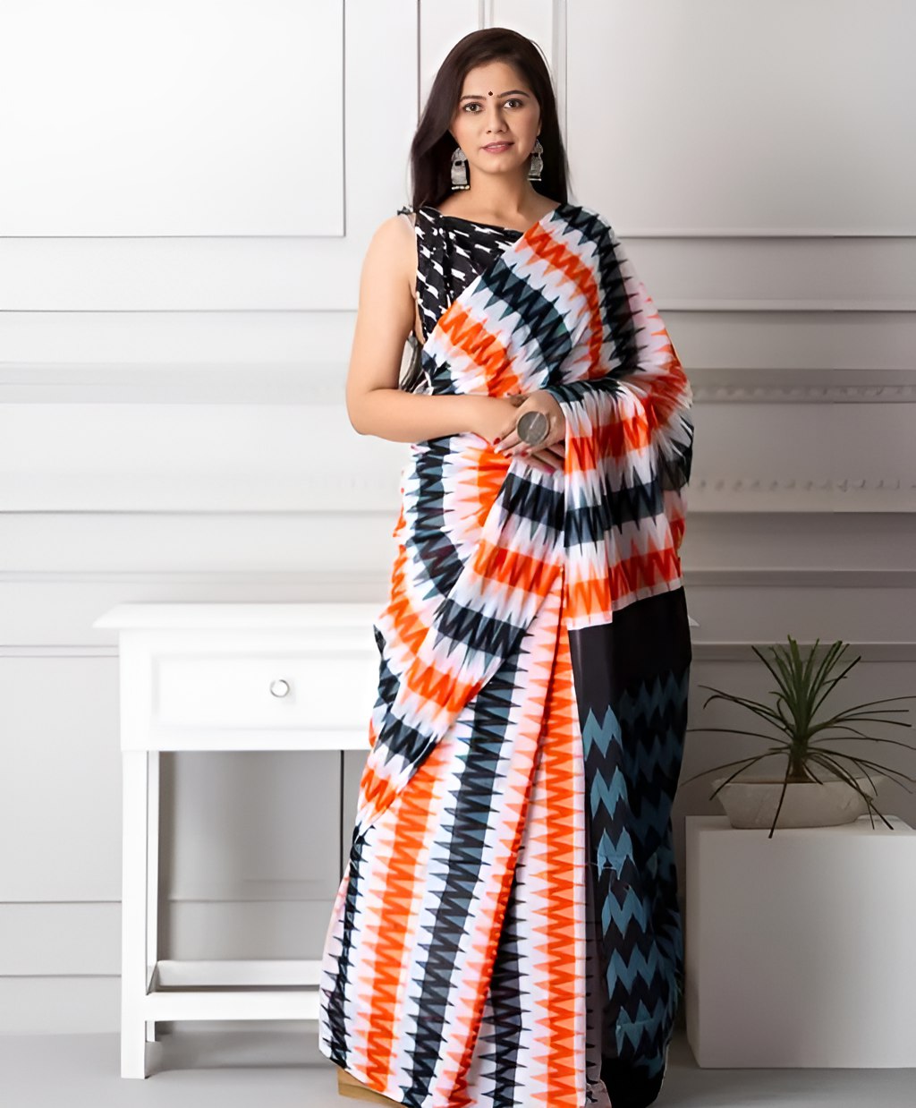 Woman wearing elegant multicolor zigzag printed pure linen cotton saree