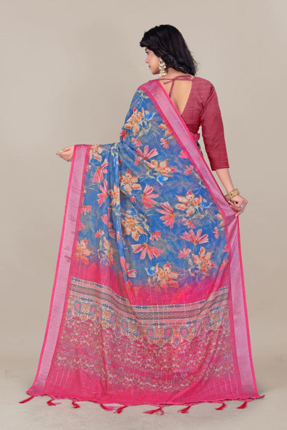 Woman wearing blue floral printed linen cotton saree with pink silver zari border