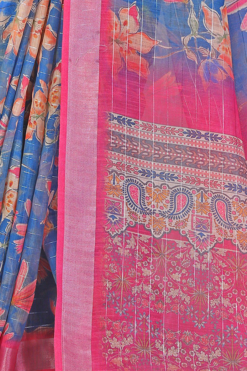 Woman wearing blue floral printed linen cotton saree with pink silver zari border