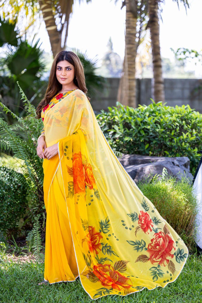 Yellow soft georgette saree with red and orange floral print