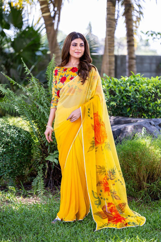 Yellow soft georgette saree with red and orange floral print