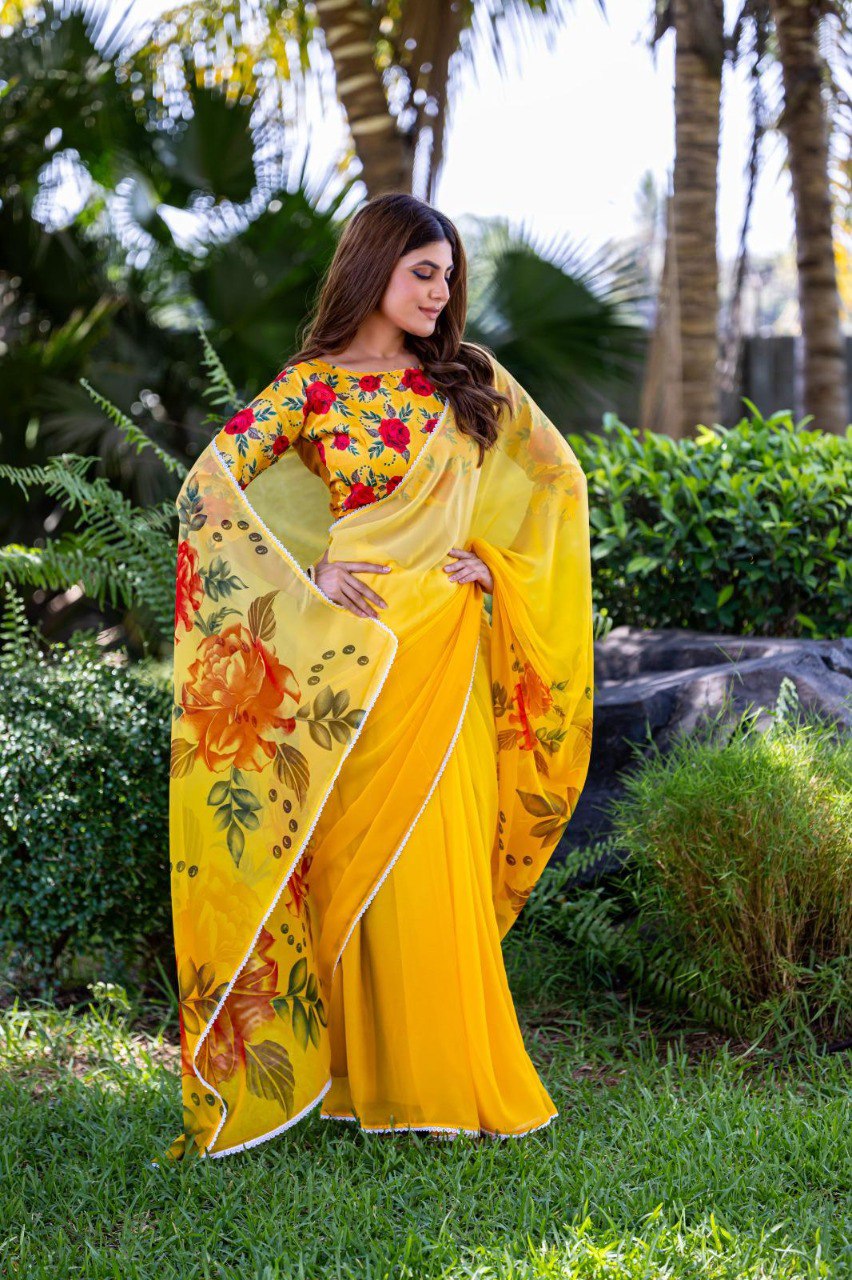 Yellow soft georgette saree with red and orange floral print

