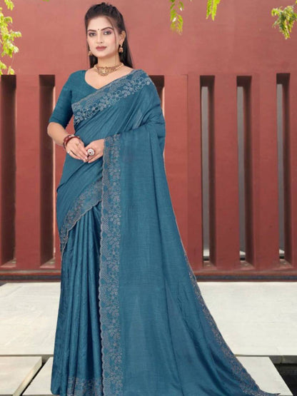 Model wearing blue Pure Soft Dola Silk saree with lace border