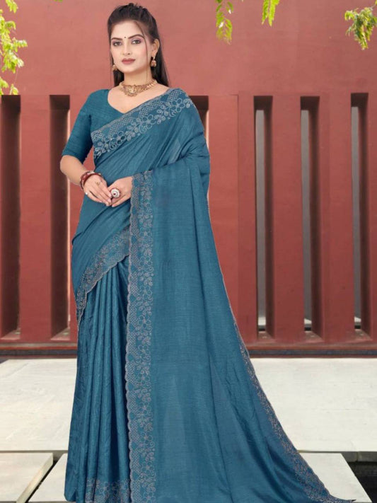 Model wearing blue Pure Soft Dola Silk saree with lace border