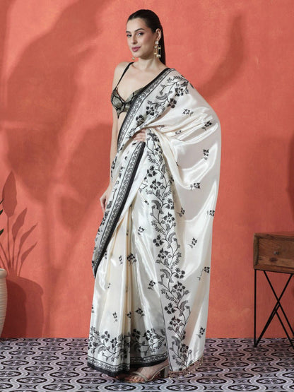 Model wearing white pure Gajri silk saree with black floral embroidery